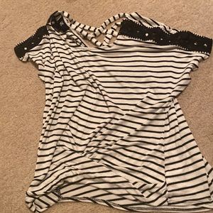 Striped shirt that’s black and white.
